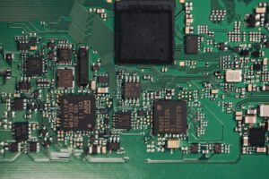 Close-up of a generic electronic circuit board, illustrating the SCINTIX P4 compute-module news